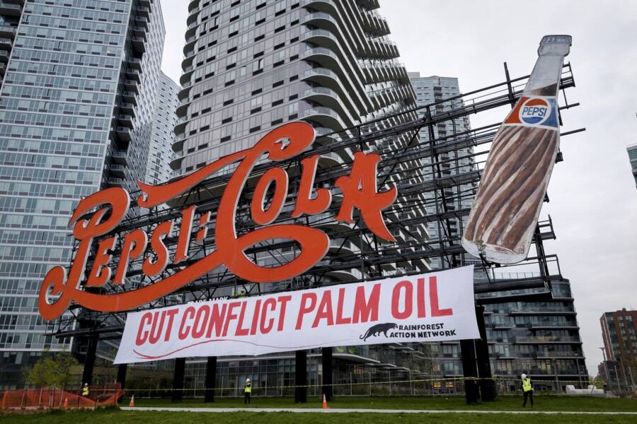In 2016, the Rainforest Action Network made a team of 5 activists climb to the base this Pepsi Cola sign’s letters in New York, to drop a massive 100 by 15 foot banner that called on Pepsi to eliminate Conflict Palm Oil from its supply chains.